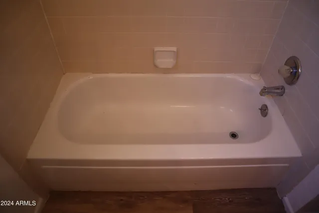 a bathroom with a bathtub