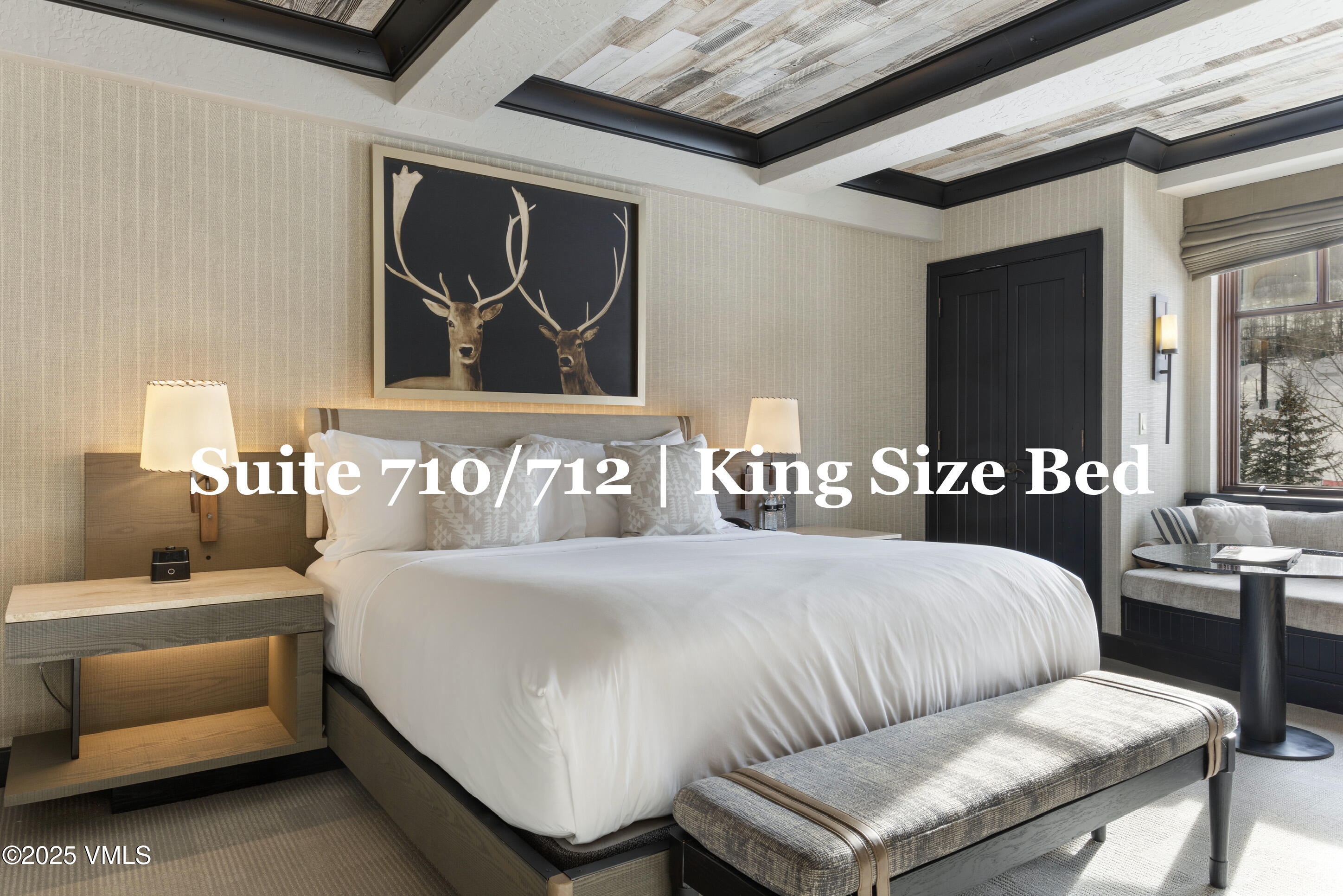 130 Daybreak Ridge Road, Unit HS710 Avon, CO 81620 - Photo 38 of 76 a bedroom with a bed and window