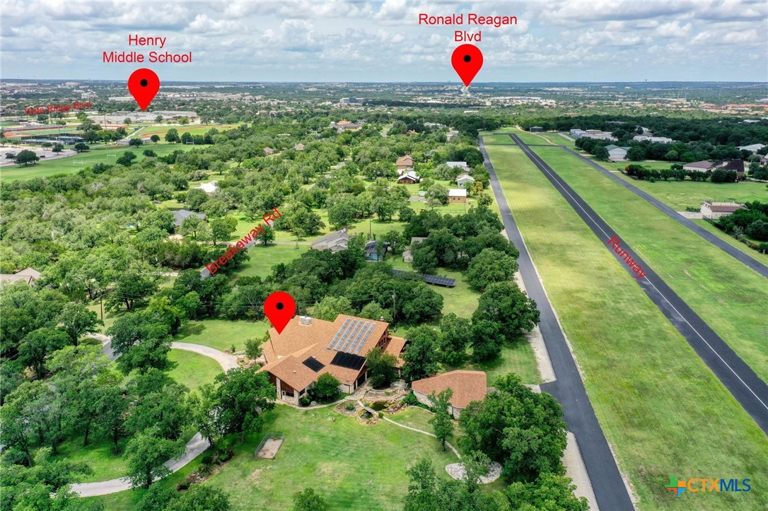 700 Breakaway Road Cedar Park, TX 78613 - Photo 33 of 38 Aerial view of house and runway looking north.