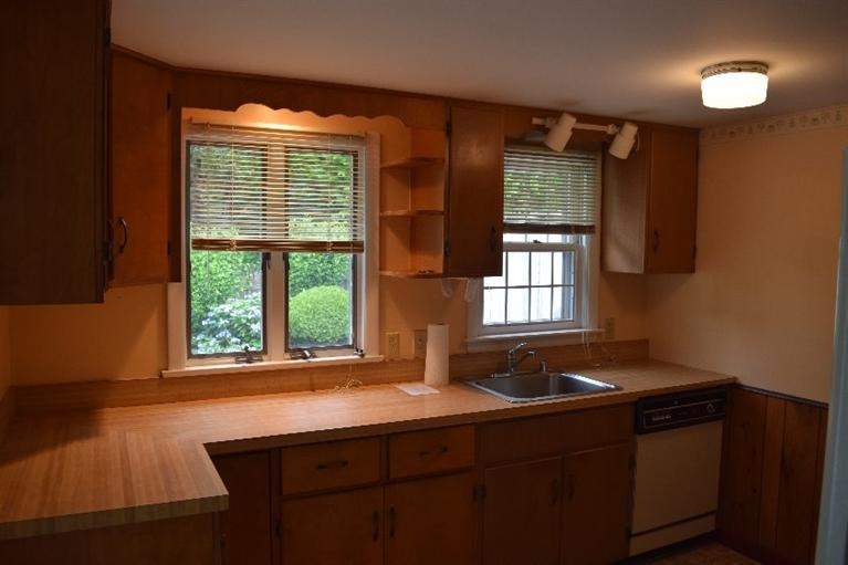 62 Cedar Land Road Orleans, MA 02653 - Photo 12 of 30 a kitchen with a sink and large window