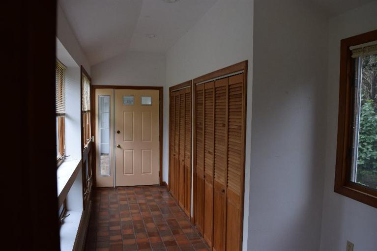 62 Cedar Land Road Orleans, MA 02653 - Photo 15 of 30 a view of a hallway with wooden shelves