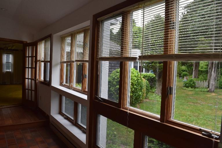 62 Cedar Land Road Orleans, MA 02653 - Photo 16 of 30 a view of a balcony that has a bed