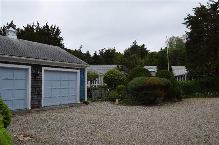 62 Cedar Land Road Orleans, MA 02653 - Photo 4 of 30 a view of a car garage