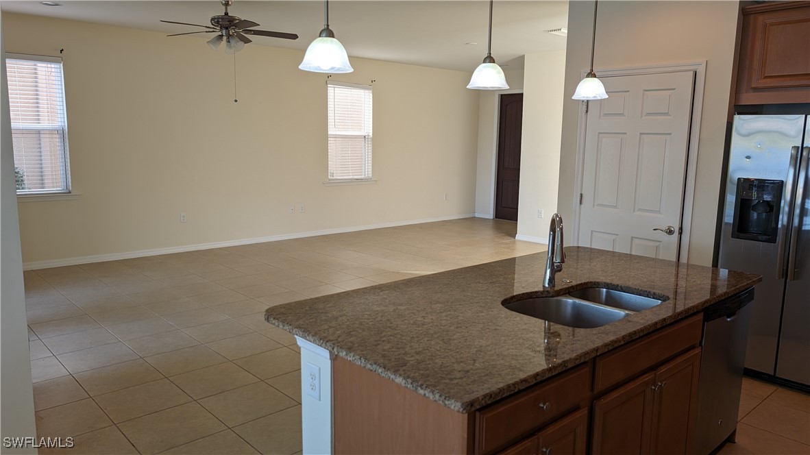 3552 Brittons Court Fort Myers, FL 33916 - Photo 14 of 27 a kitchen with sink cabinets and window