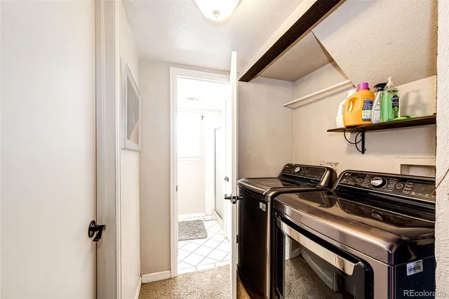a kitchen with a stove and a microwave