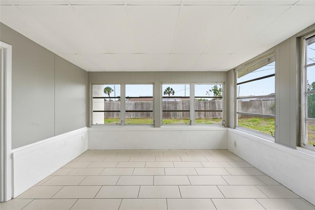 363 Glen Oak Road Venice, FL 34293 - Photo 24 of 53 a view of an empty room with a window