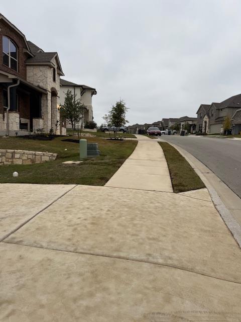1432 Ridge Runner Drive Georgetown, TX 78628 - Photo 3 of 3 a view of swimming pool in front of residential houses