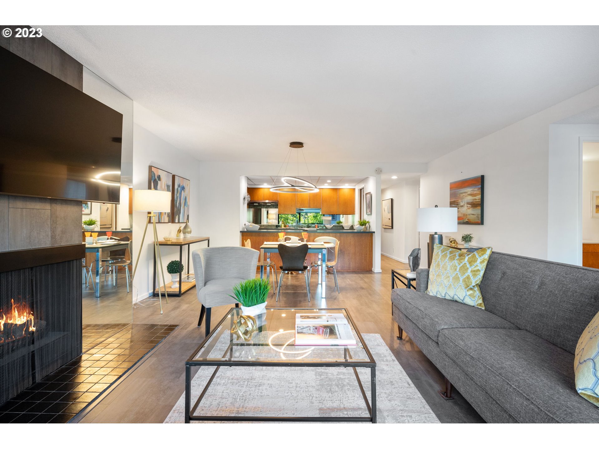 2309 Southwest 1st Avenue, Unit 441 Portland, OR 97201 - Photo 15 of 39 a living room with furniture and a flat screen tv