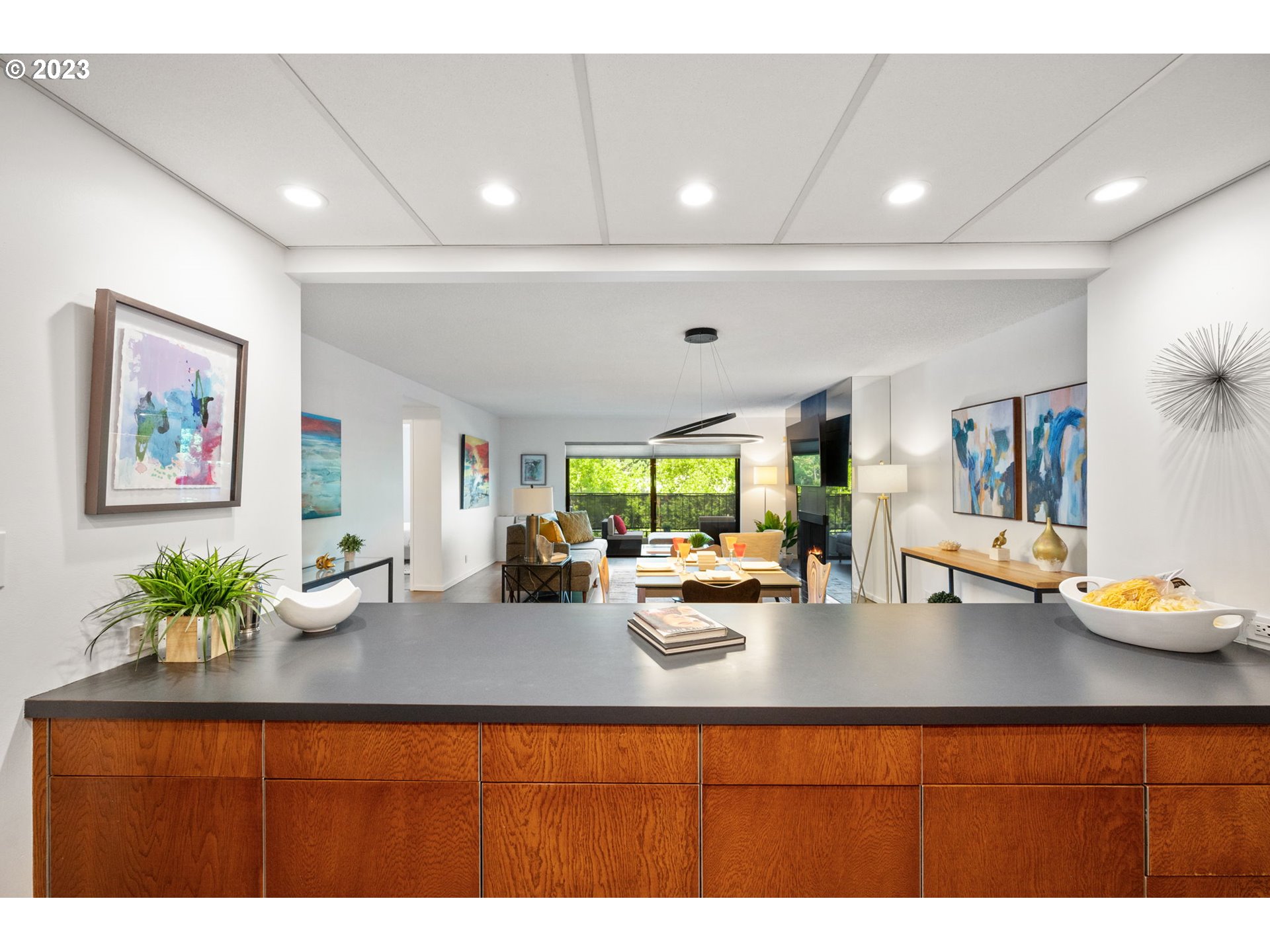 2309 Southwest 1st Avenue, Unit 441 Portland, OR 97201 - Photo 22 of 39 a kitchen with sink refrigerator and large window