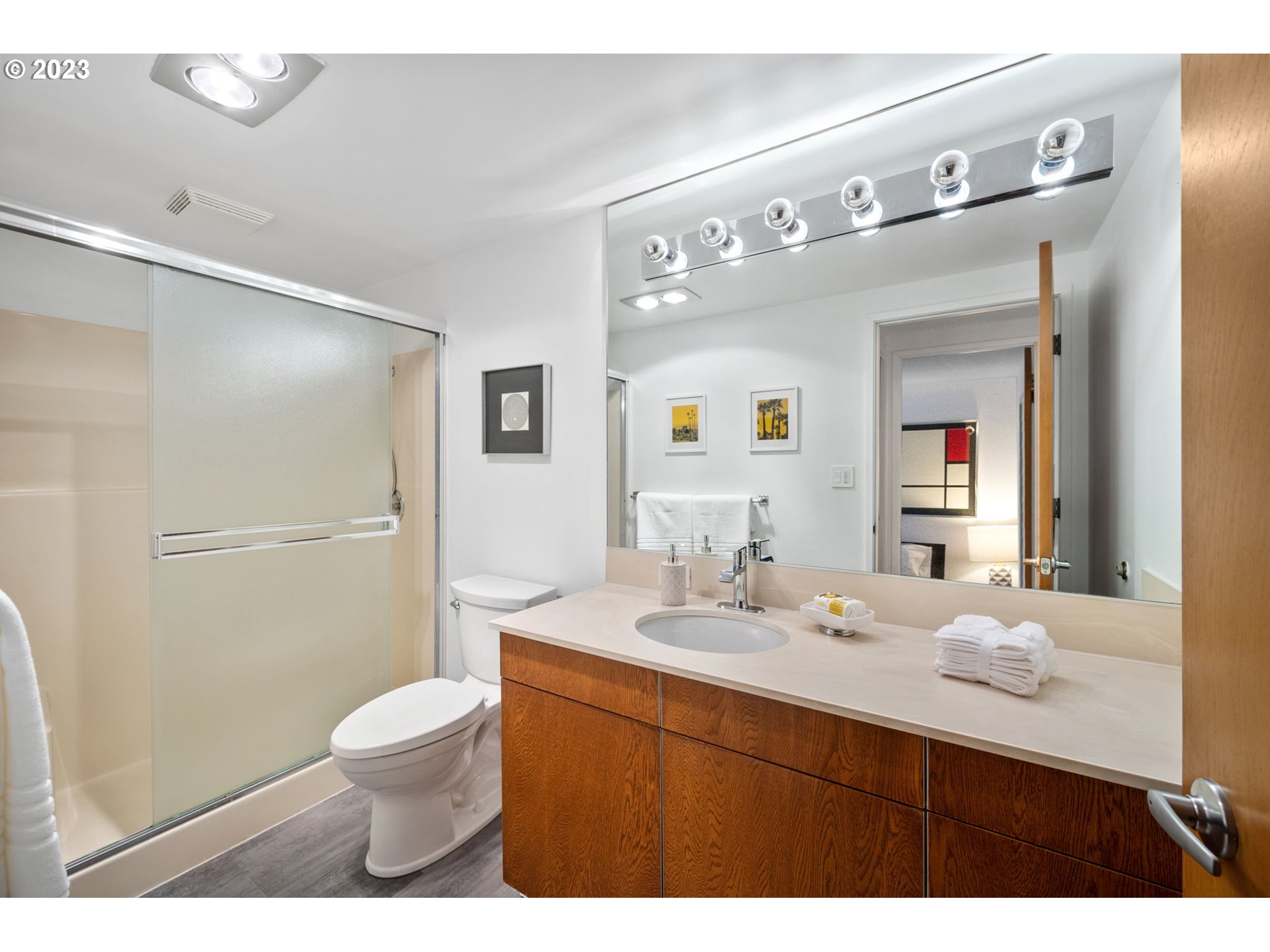 2309 Southwest 1st Avenue, Unit 441 Portland, OR 97201 - Photo 27 of 39 a bathroom with a sink vanity granite and toilet