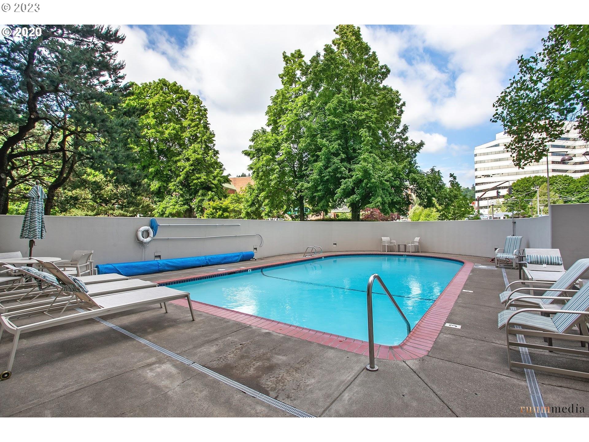 2309 Southwest 1st Avenue, Unit 441 Portland, OR 97201 - Photo 36 of 39 a small pool with a bench in the patio