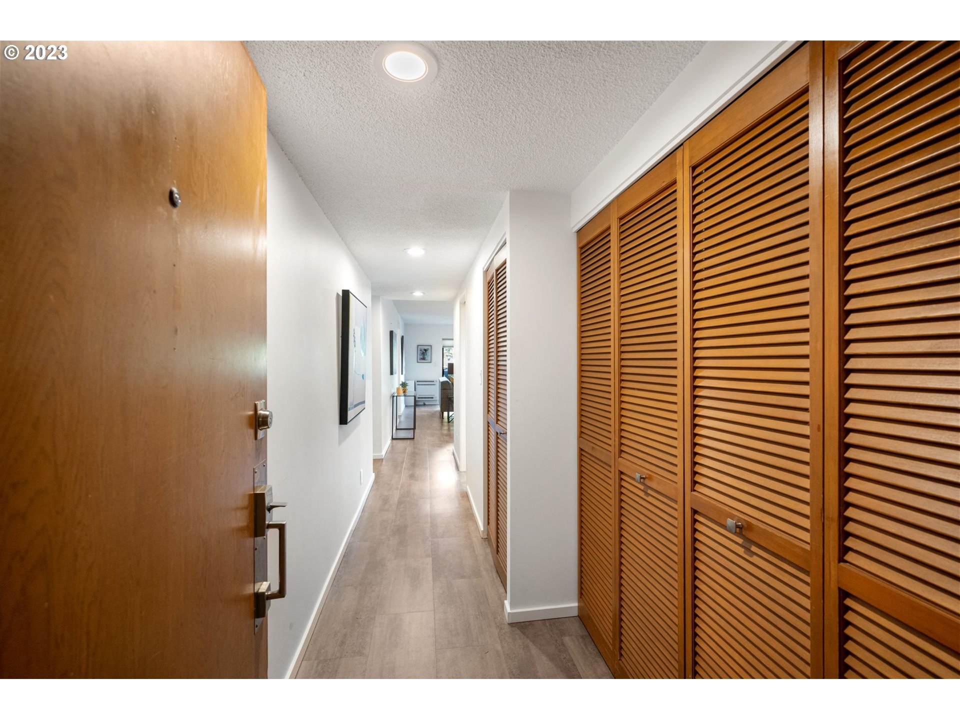 2309 Southwest 1st Avenue, Unit 441 Portland, OR 97201 - Photo 4 of 39 a view of hallway with wooden floor