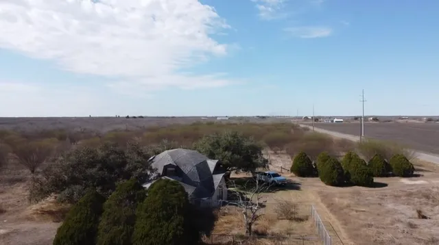 a view of a terrace with a yard