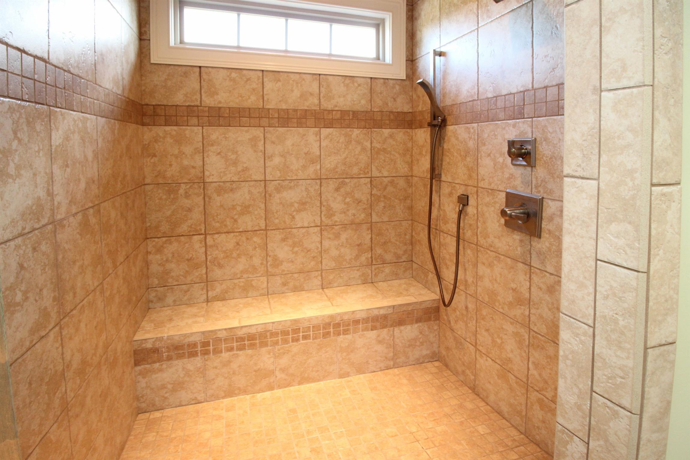 4385 Goodman Road Adams, TN 37010 - Photo 20 of 30 Large Tile Shower with Bench