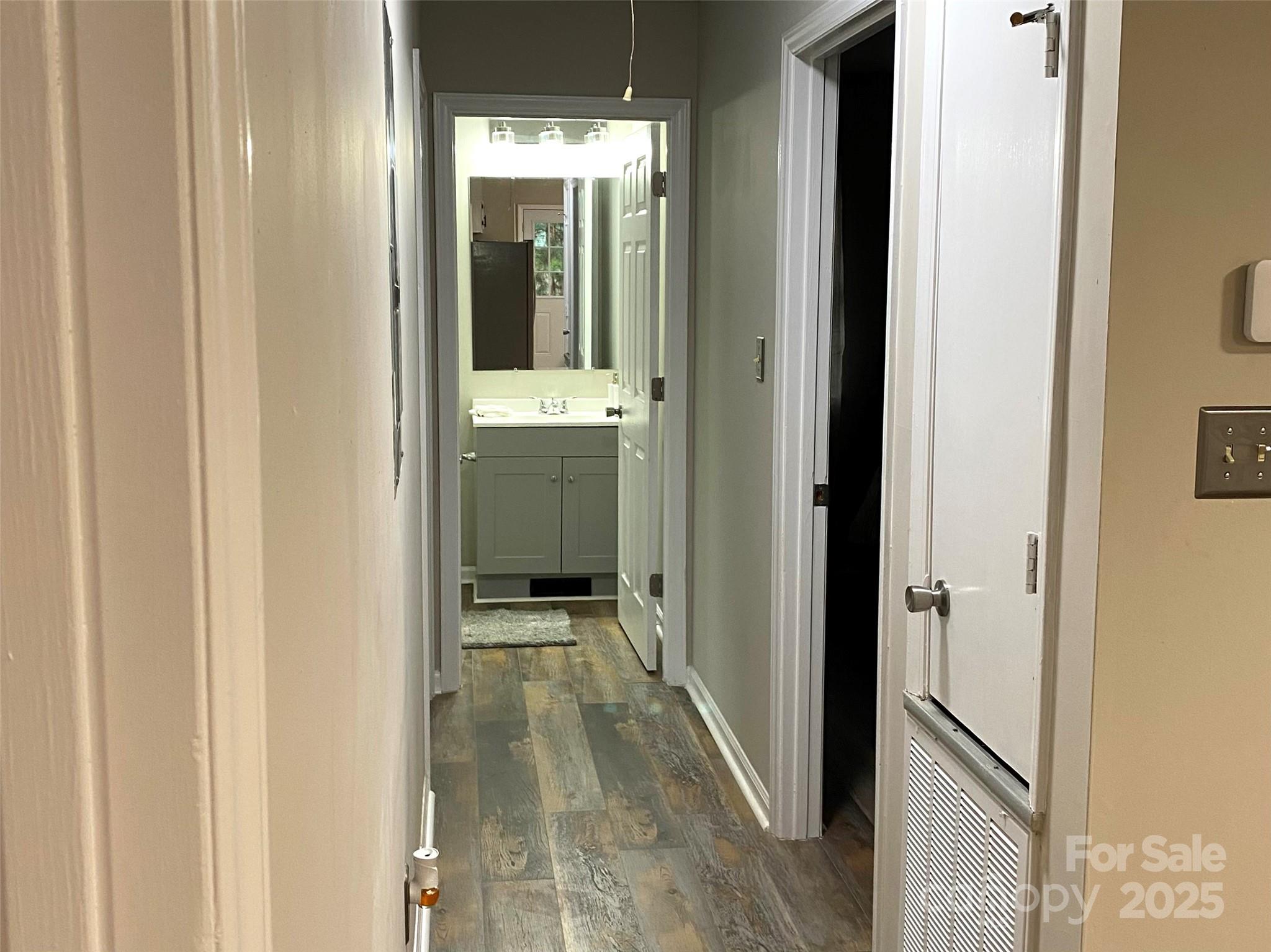 802 Marshall Street Cheraw, SC 29520 - Photo 14 of 16 a view of hallway with shower and sink