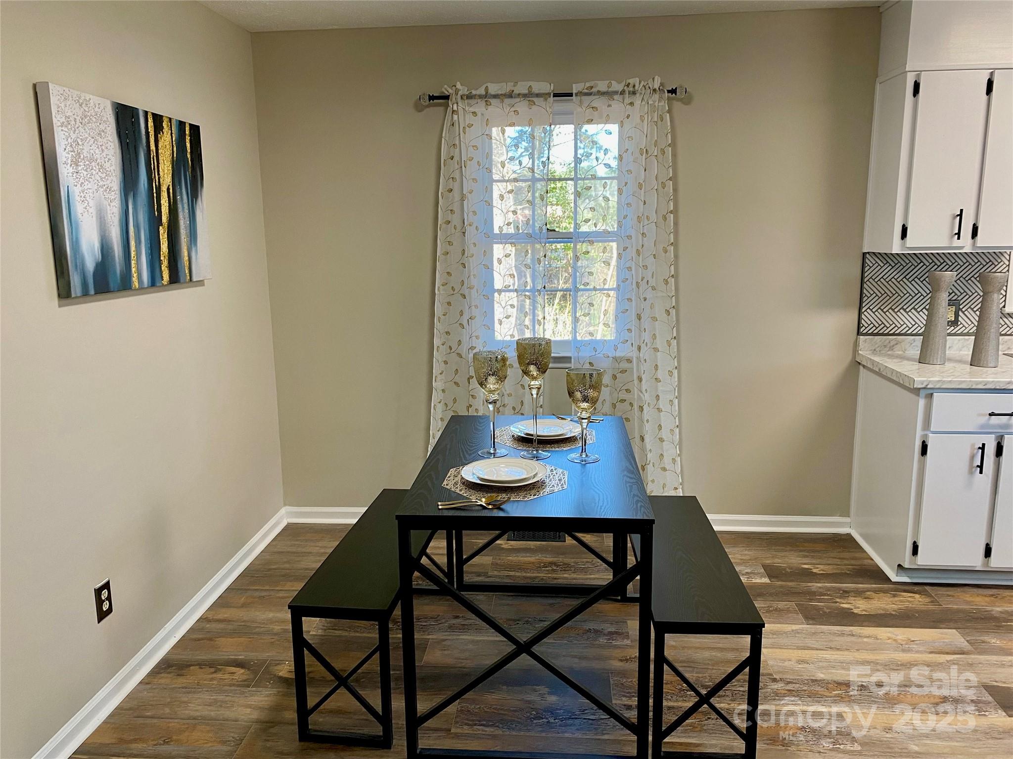 802 Marshall Street Cheraw, SC 29520 - Photo 7 of 16 a view of a room with furniture and wooden floor