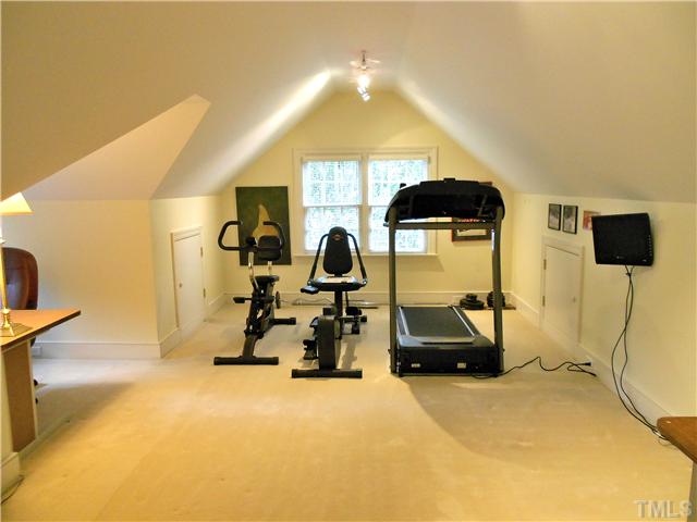 2831 Exeter Circle Raleigh, NC 27608 - Photo 17 of 25 a view of a room with gym equipment