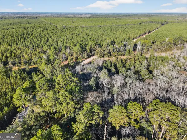 a view of a city with an ocean