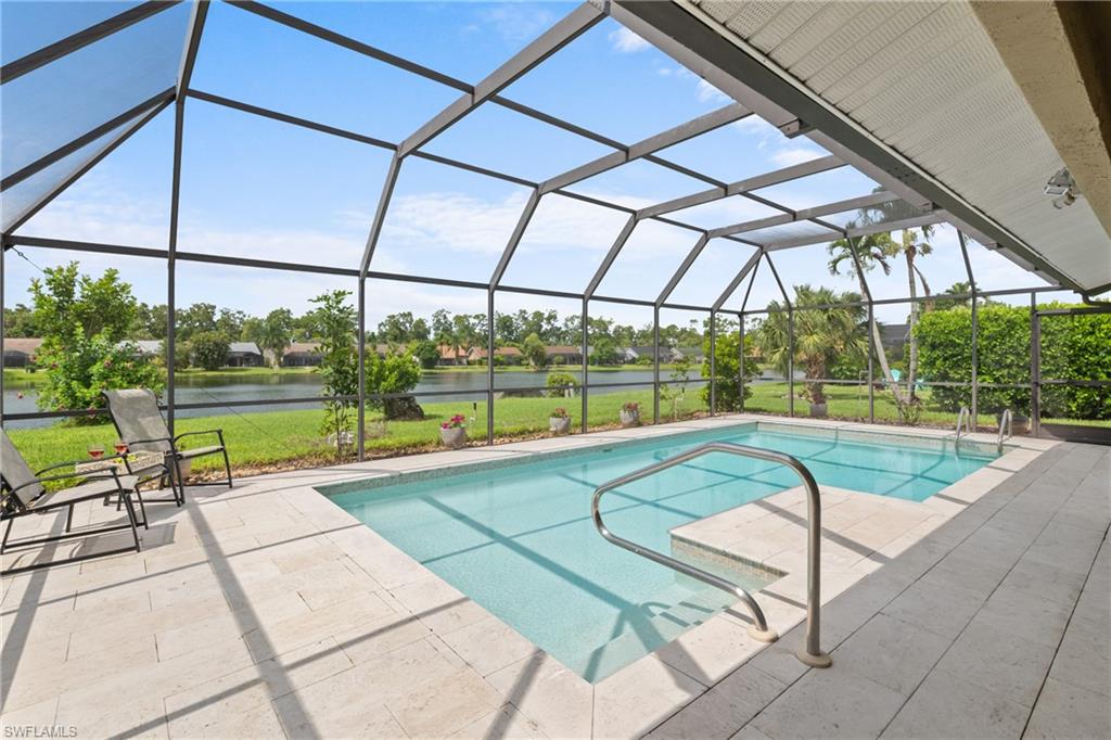 a view of a swimming pool with a porch