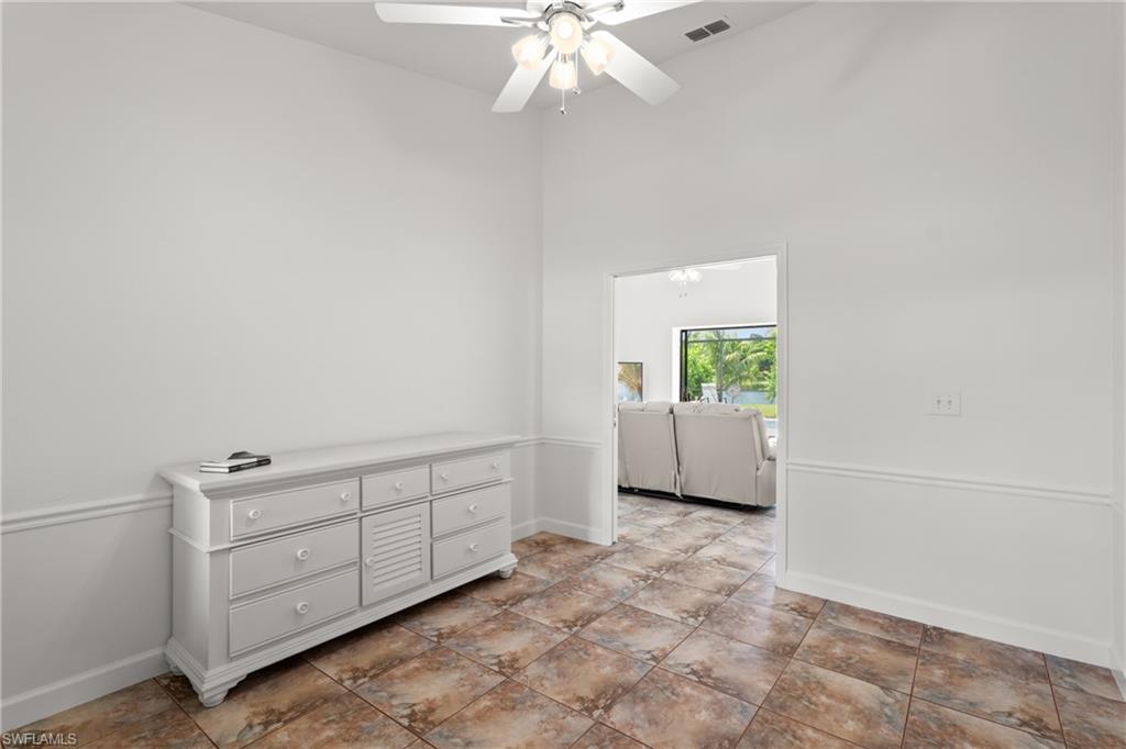 1348 Monarch Circle Naples, FL 34116 - Photo 20 of 33 a view of an empty room with a window