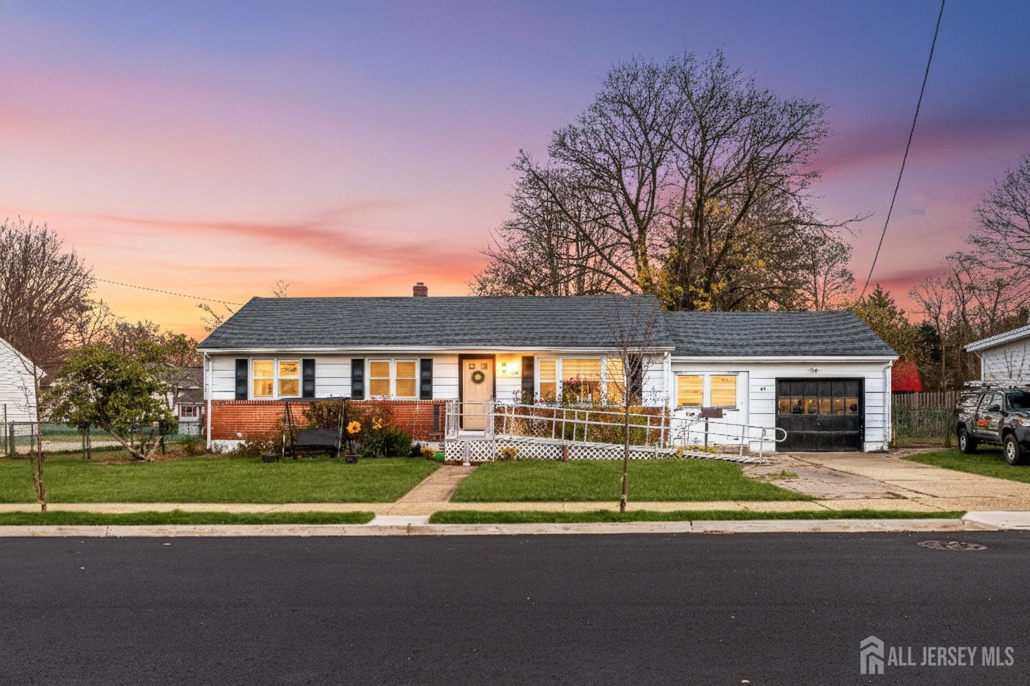 149 Springdale Avenue Hamilton, NJ 08620 - Photo 1 of 43 a view of house with a big yard and potted plants