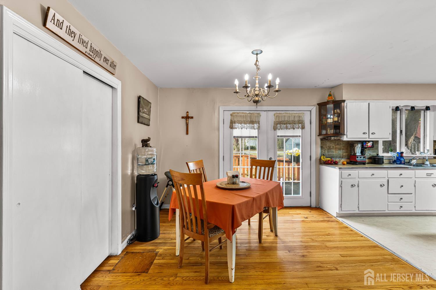 149 Springdale Avenue Hamilton, NJ 08620 - Photo 19 of 43 a view of a dining room with furniture and chandelier