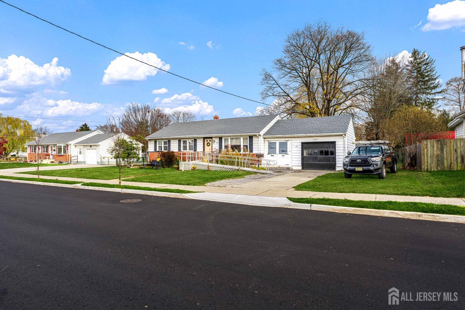149 Springdale Avenue Hamilton, NJ 08620 - Photo 2 of 43 a view of house with outdoor space and sitting area