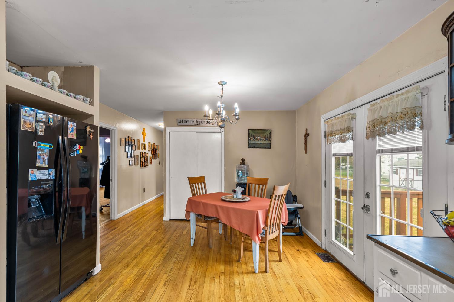 149 Springdale Avenue Hamilton, NJ 08620 - Photo 23 of 43 a view of a dining room with furniture window and wooden floor