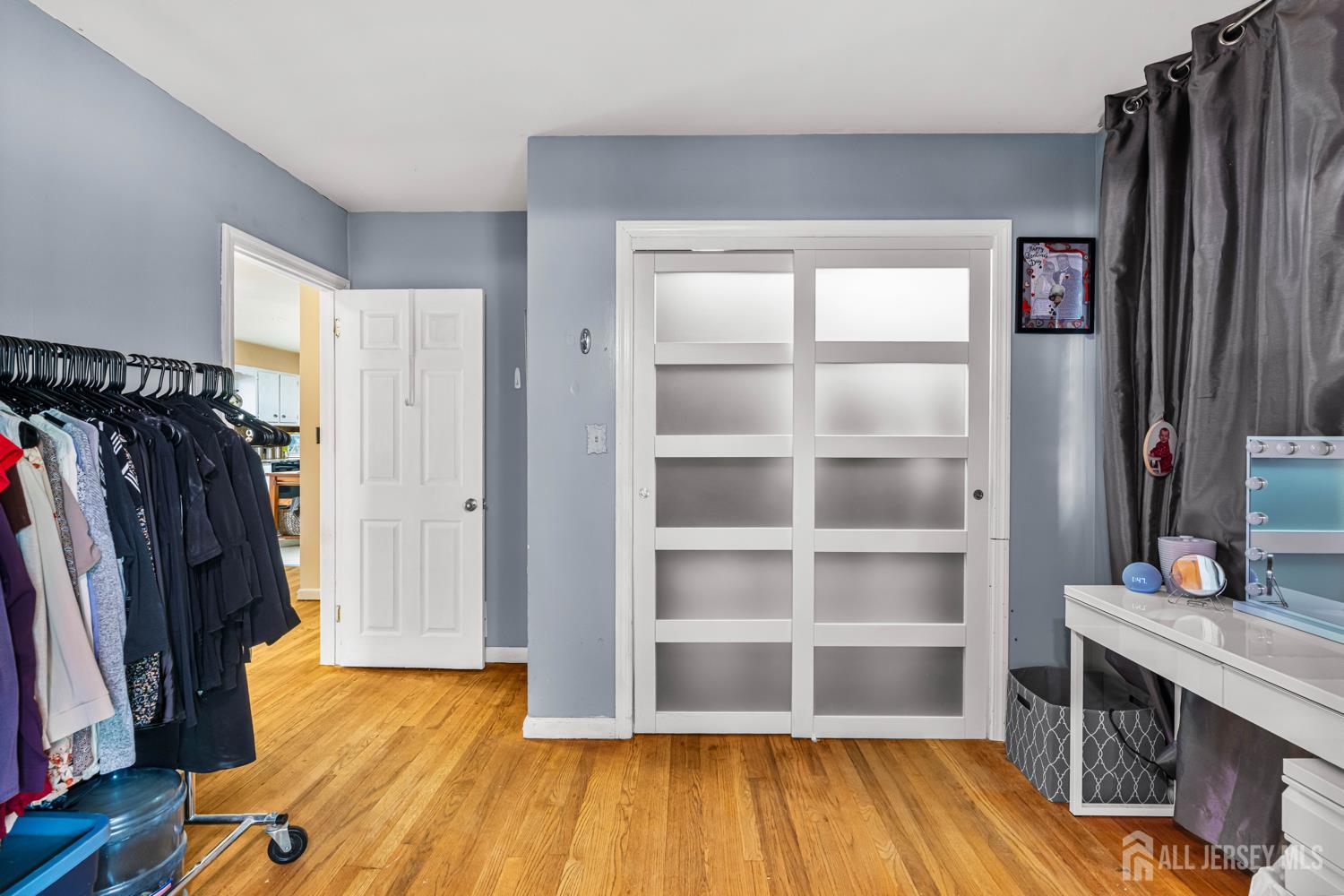149 Springdale Avenue Hamilton, NJ 08620 - Photo 28 of 43 a view of walk in closet with clothes and shoes