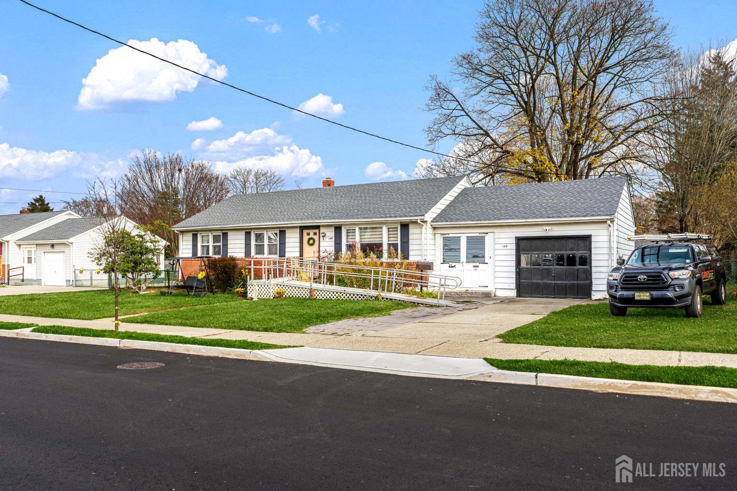 149 Springdale Avenue Hamilton, NJ 08620 - Photo 4 of 43 a front view of house with yard and green space