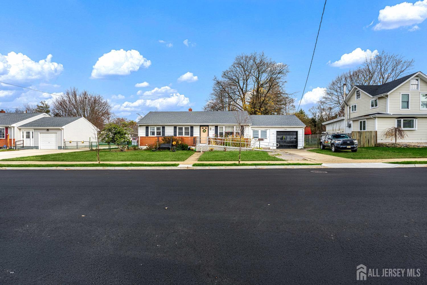 149 Springdale Avenue Hamilton, NJ 08620 - Photo 6 of 43 a view of street with houses