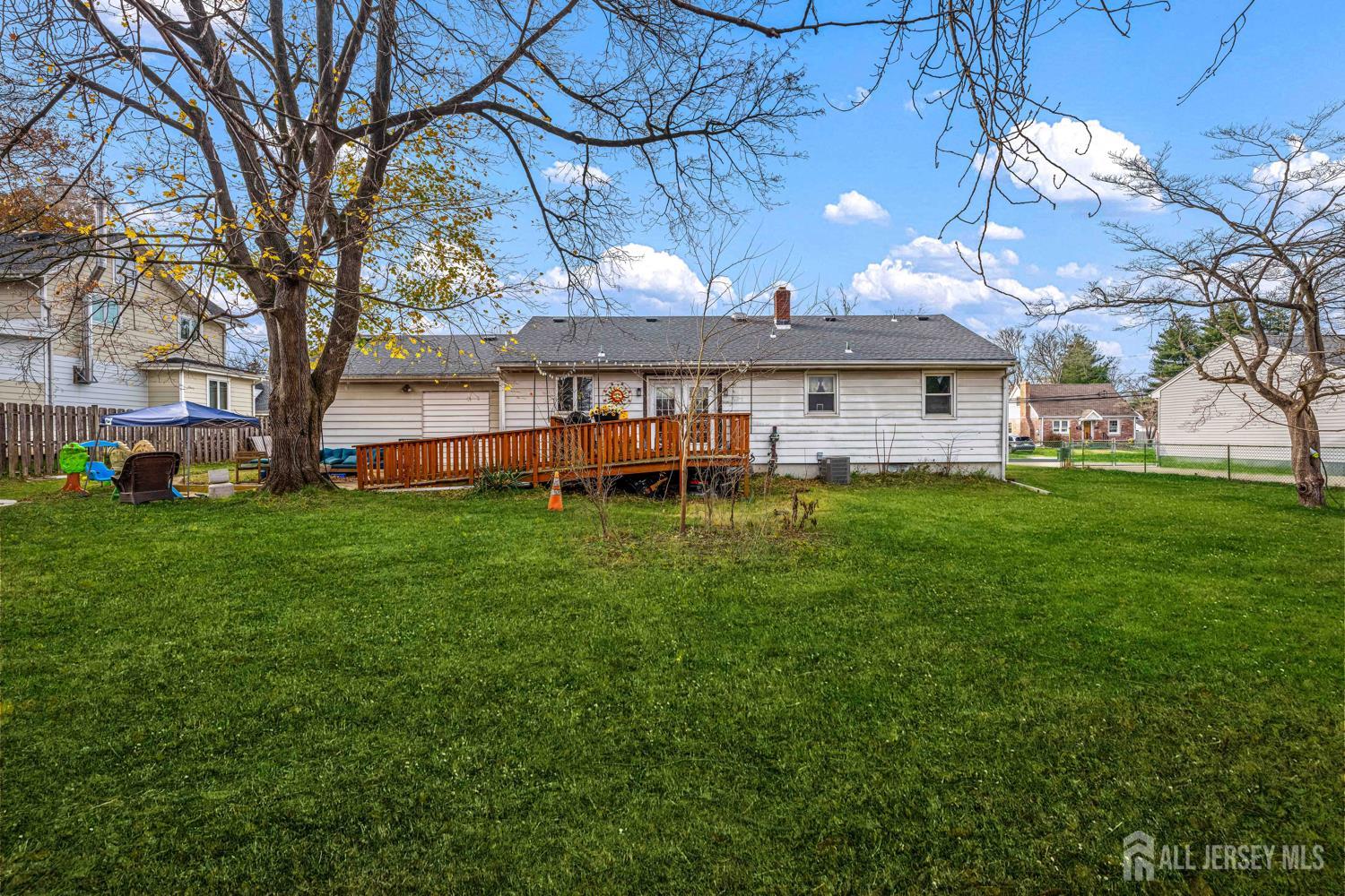 149 Springdale Avenue Hamilton, NJ 08620 - Photo 10 of 43 a view of a house with a backyard