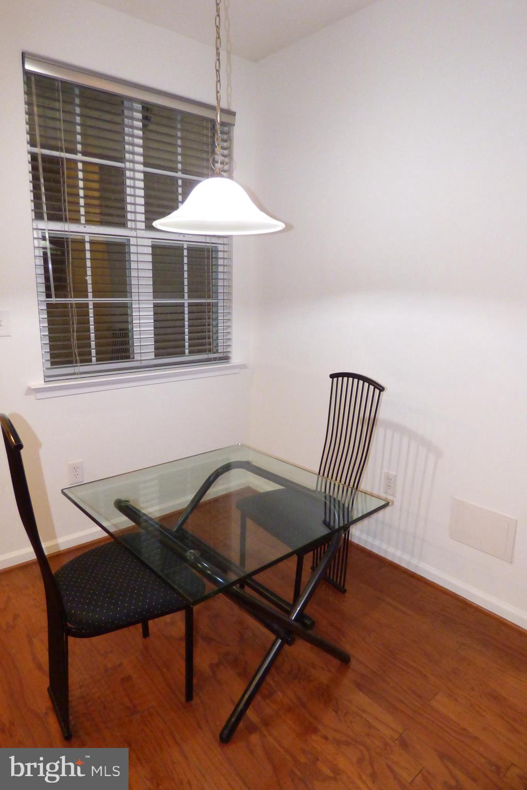 13113 Winding Trail Road Laurel, MD 20707 - Photo 15 of 47 a view of a dining room with furniture and chandelier