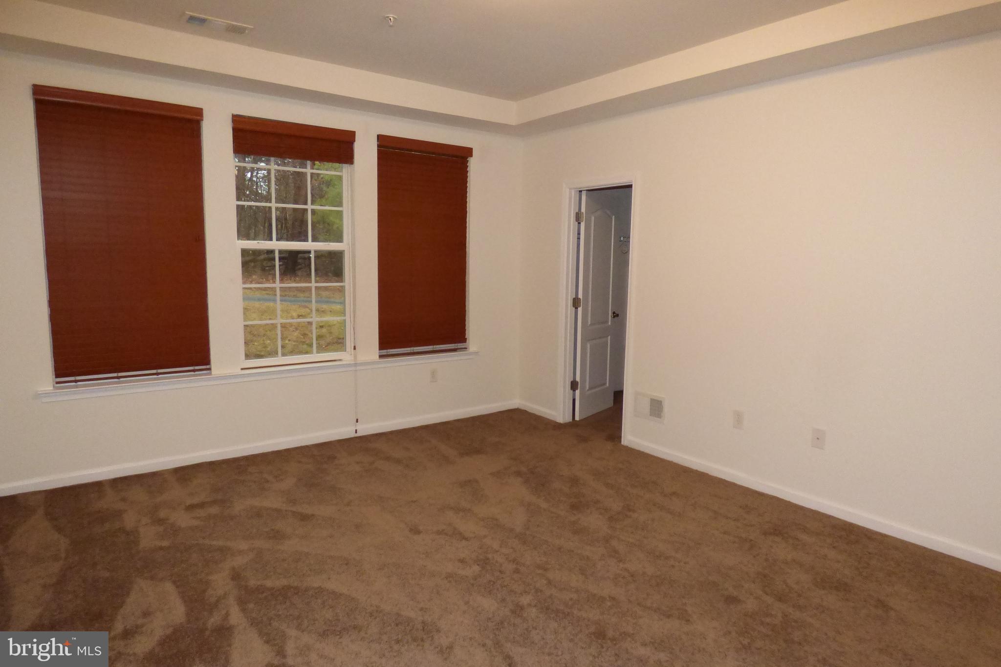 13113 Winding Trail Road Laurel, MD 20707 - Photo 23 of 47 an empty room with windows