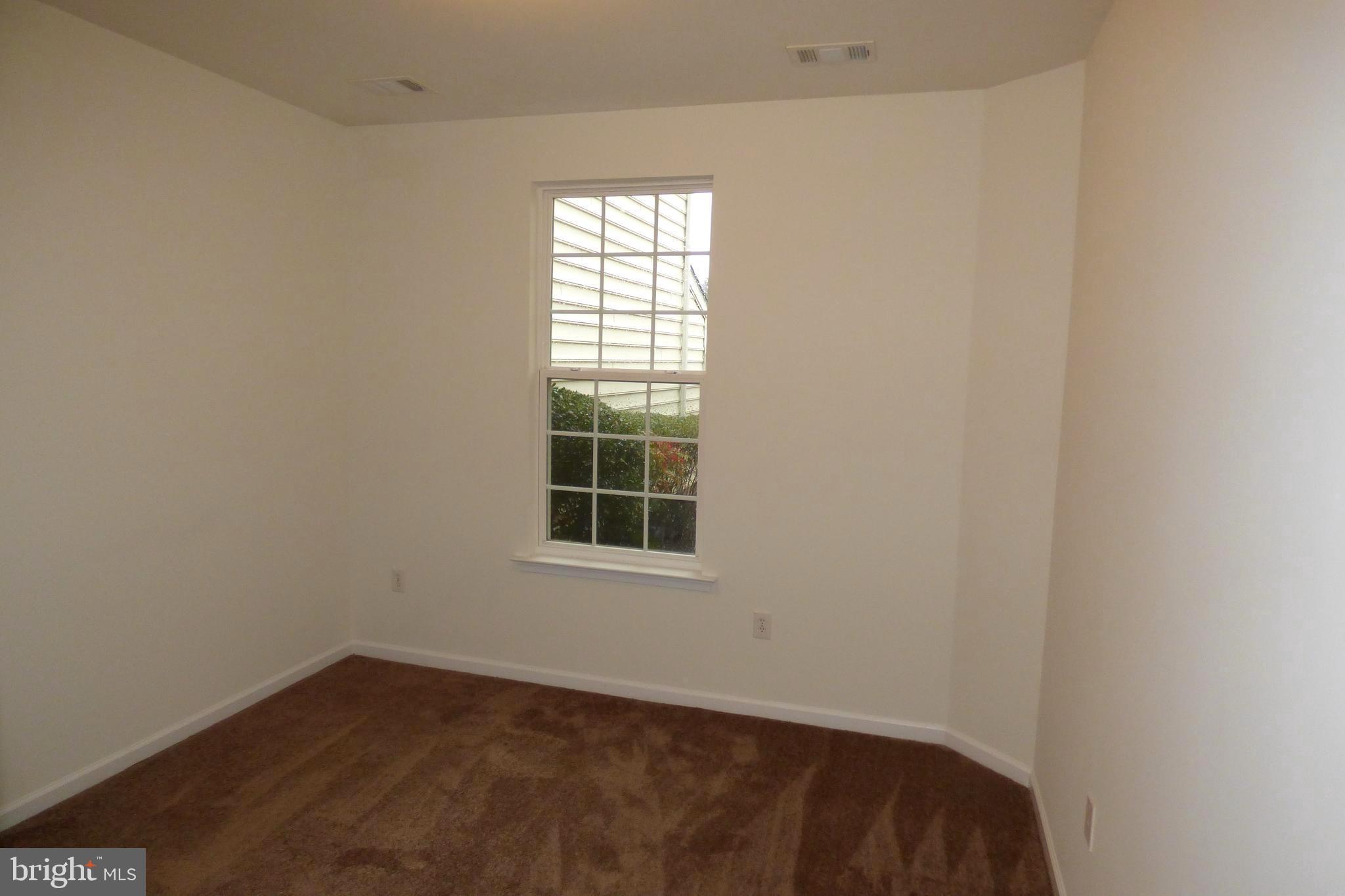13113 Winding Trail Road Laurel, MD 20707 - Photo 10 of 47 an empty room with a window