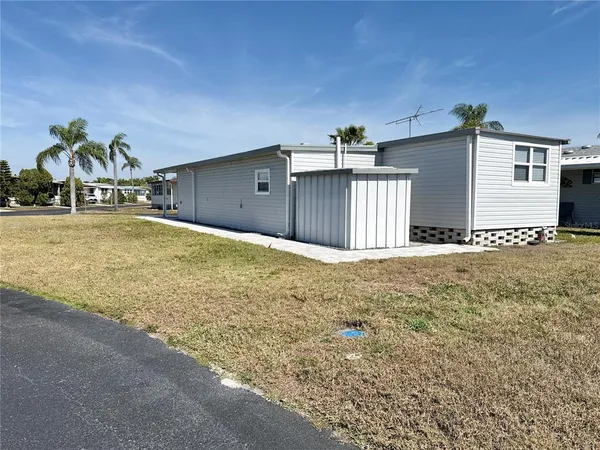 a view of a backyard of a house