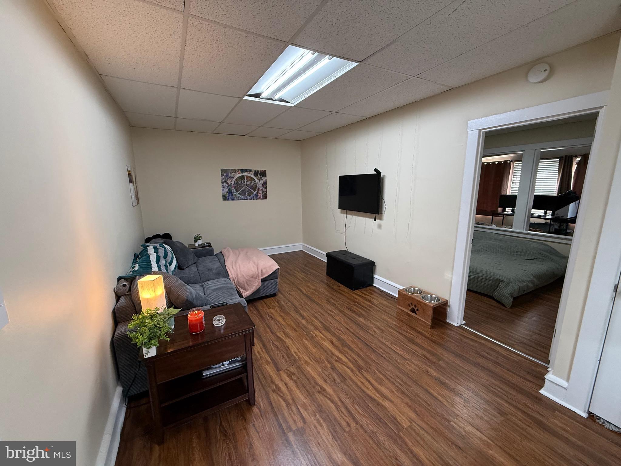 2441 Perkiomen Avenue Reading, PA 19606 - Photo 7 of 13 a living room with furniture and a flat screen tv