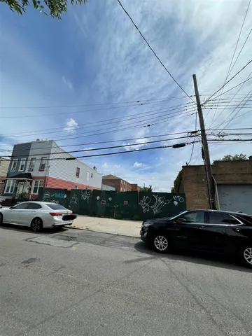 a cars parked on the side of a street