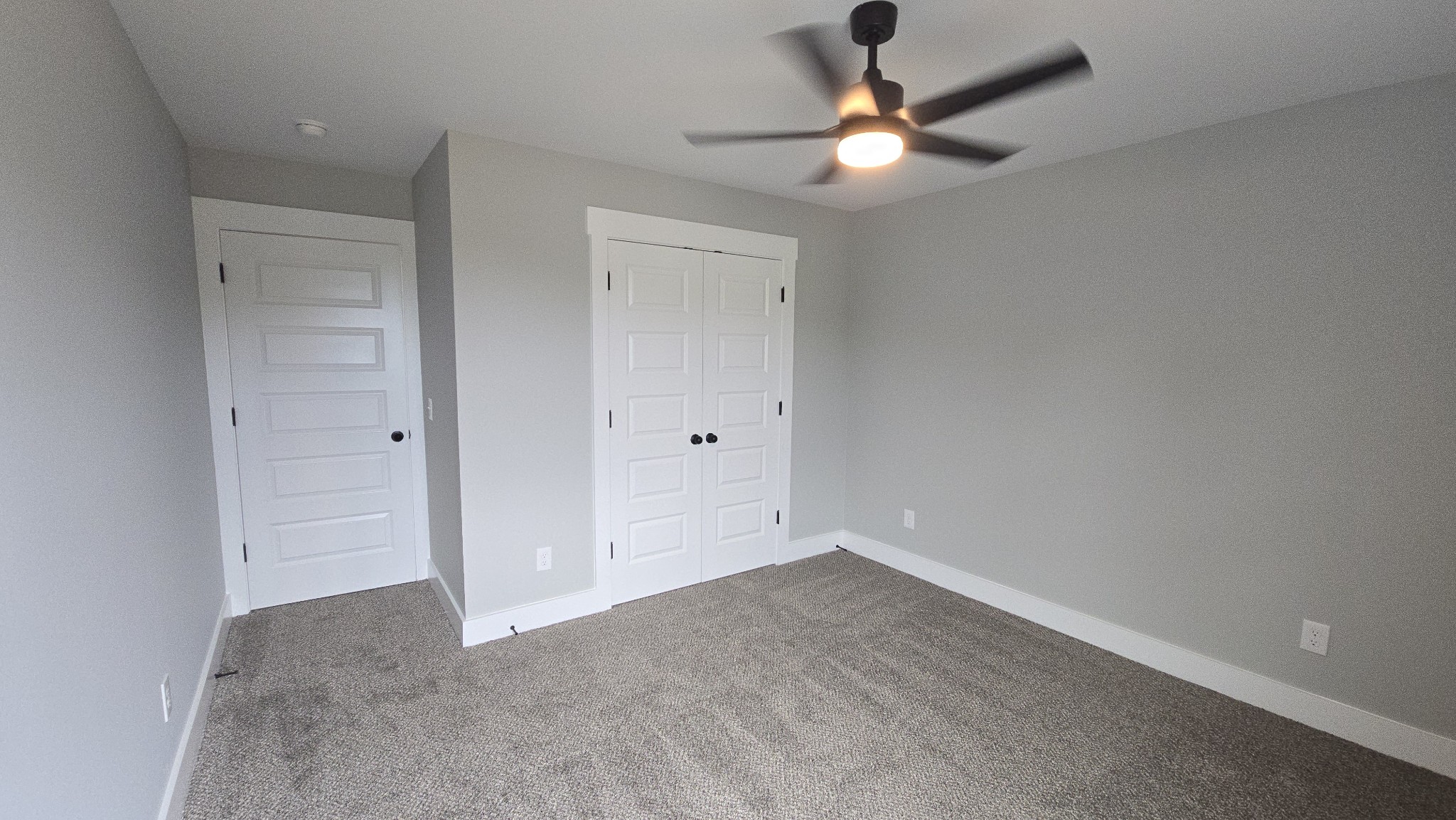 11533 Karo Road Bell Buckle, TN 37020 - Photo 14 of 22 an empty room with closet and fan
