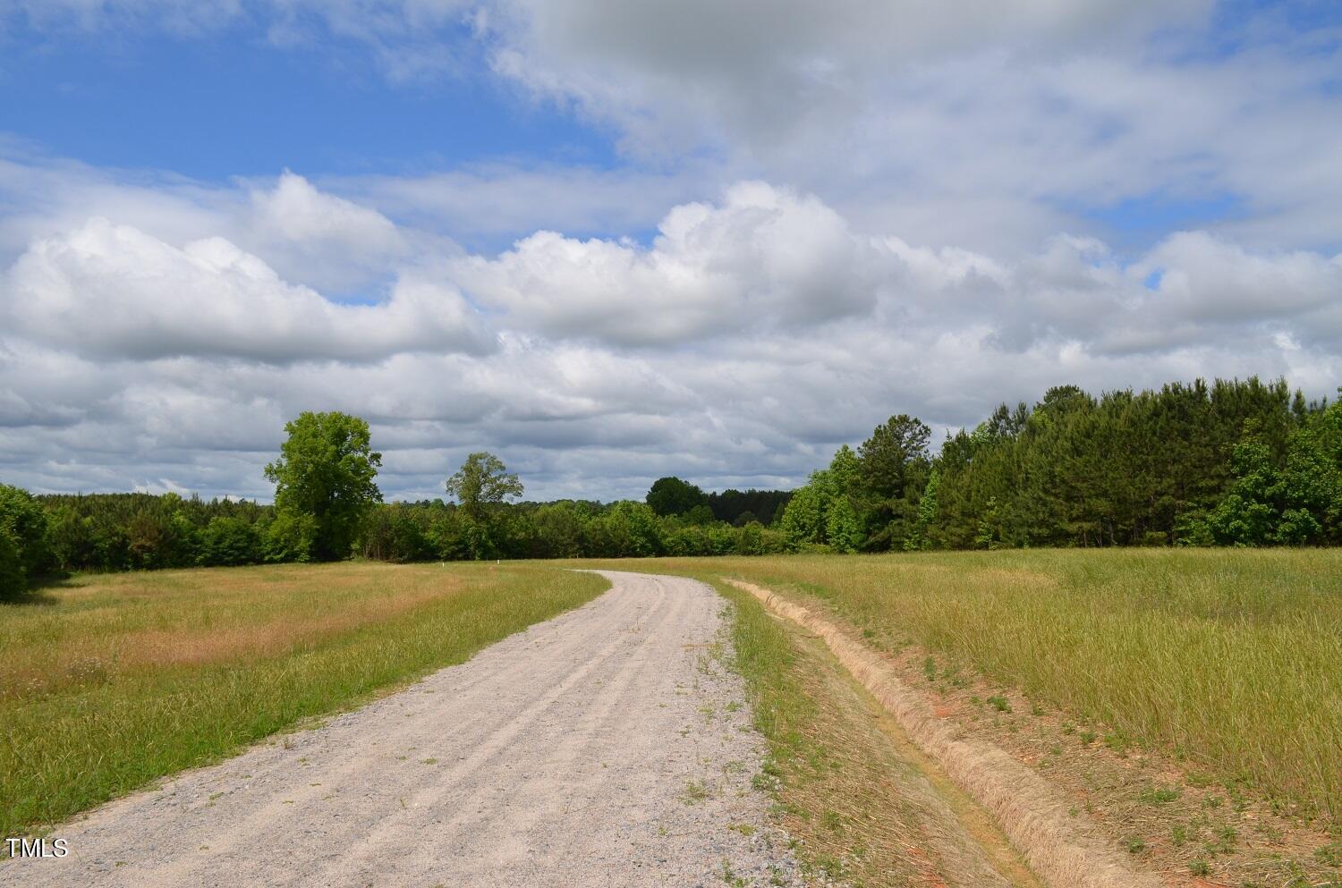 Lot D Vicksboro Road Henderson, NC 27537 - Photo 7 of 10 a view of a lake with a big yard