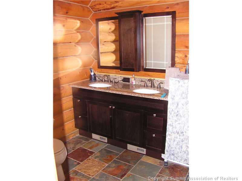 1610 Redhill Road Fairplay, CO 80440 - Photo 11 of 25 Master Bath/Spa. Slate floors, granite counter tops, slate walk-in shower and slate surrounds the spa tub.