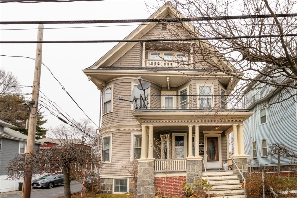 a view of a building with a street