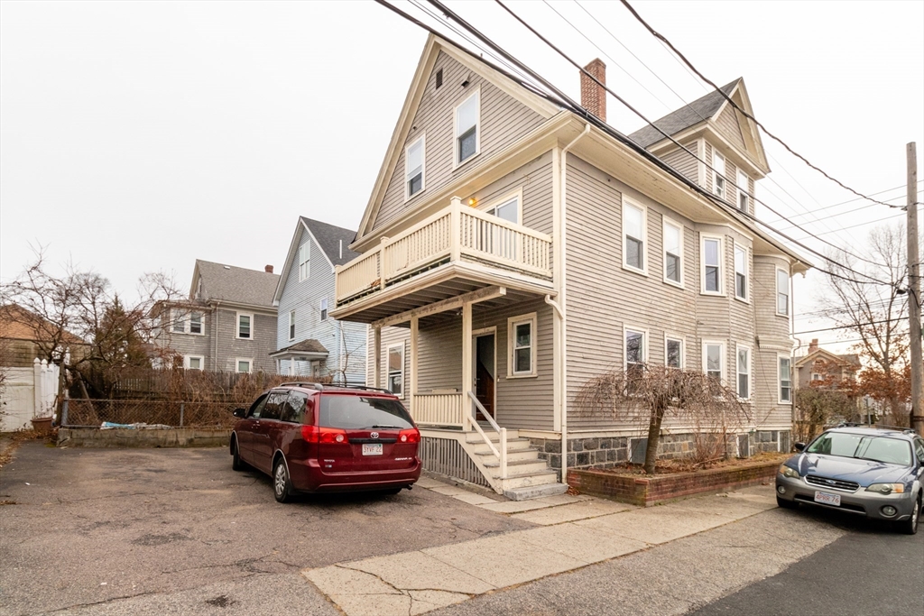 168 Brook Road Milton, MA 02186 - Photo 25 of 25 a car parked in front of a house