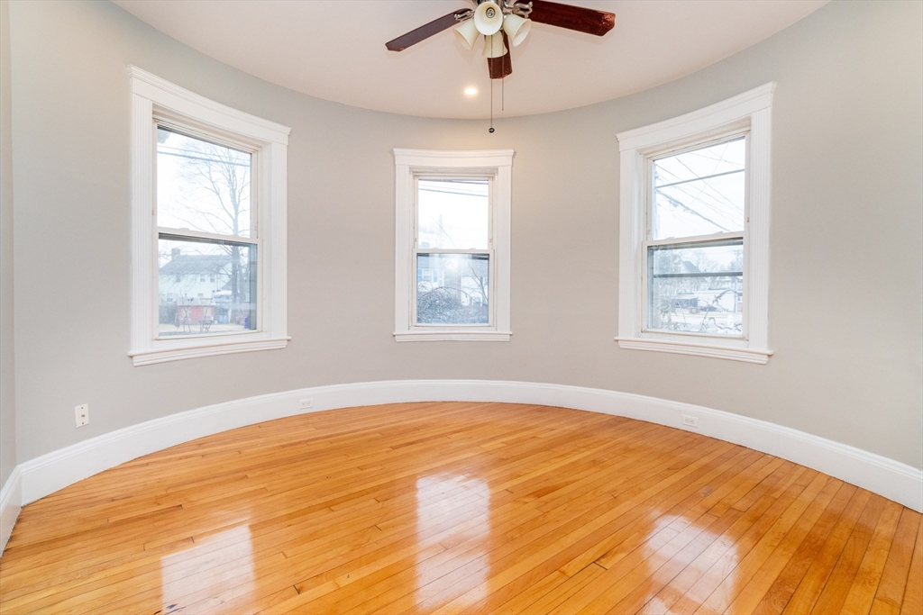 168 Brook Road Milton, MA 02186 - Photo 8 of 25 a view of an empty room with a window