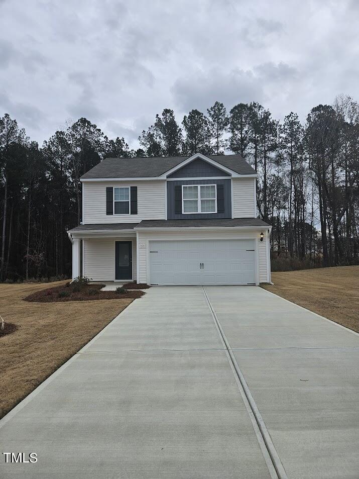 358 Coleshill Road Angier, NC 27501 - Photo 1 of 14 front view of a house with a yard