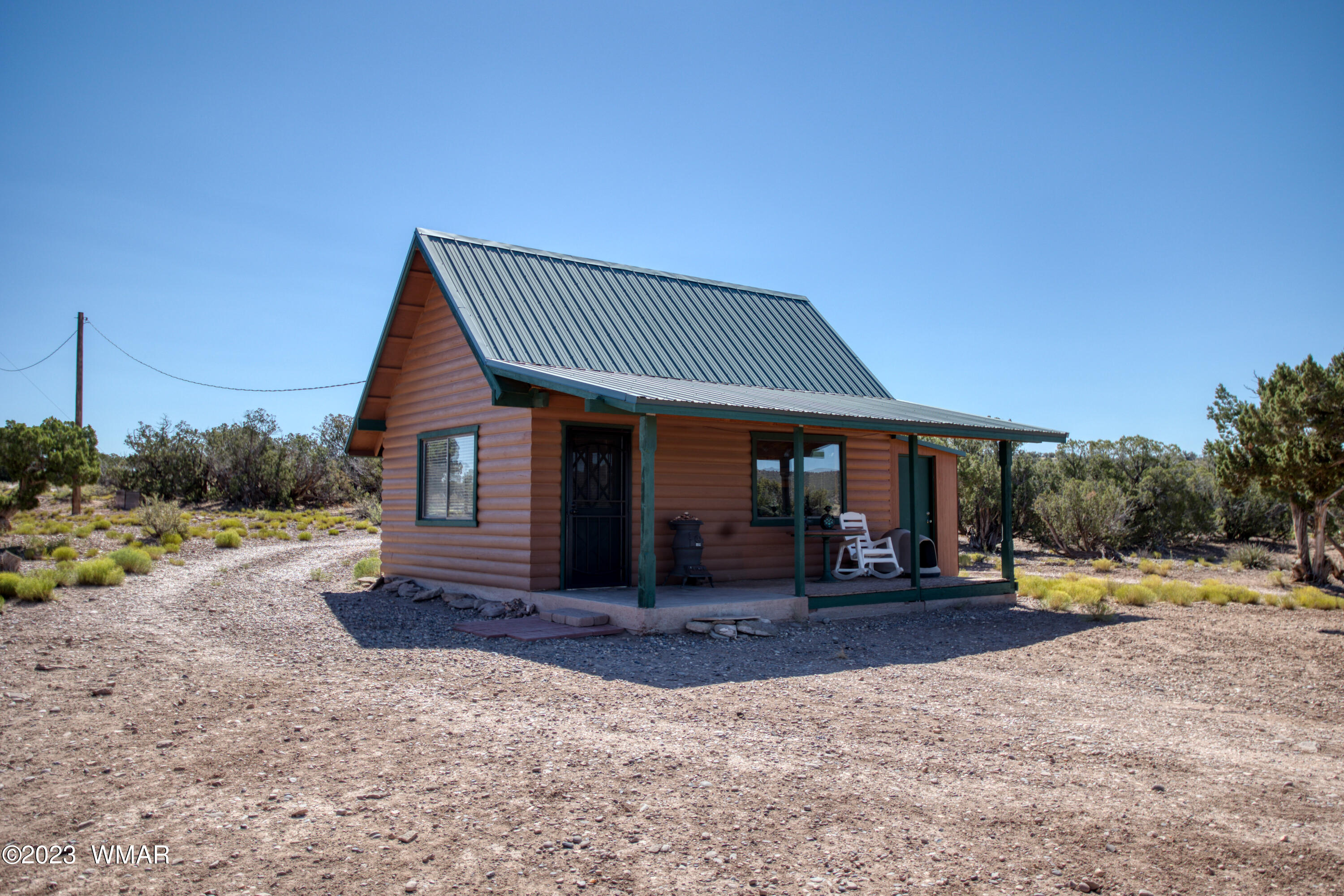 4558 Stirrup Road Snowflake, AZ 85937 - Photo 1 of 16 a front view of a house with a yard