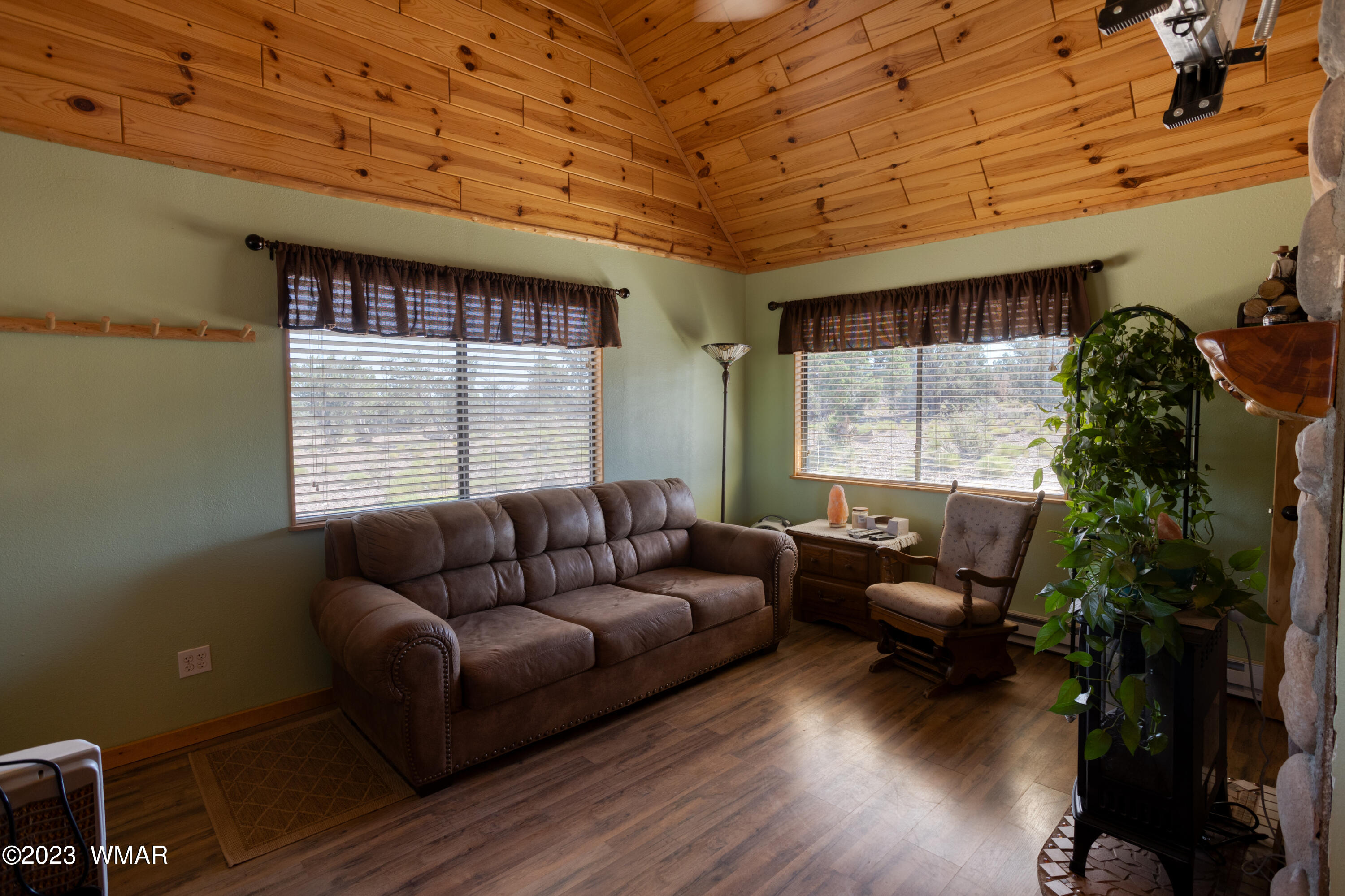 4558 Stirrup Road Snowflake, AZ 85937 - Photo 3 of 16 a living room with furniture and a large window