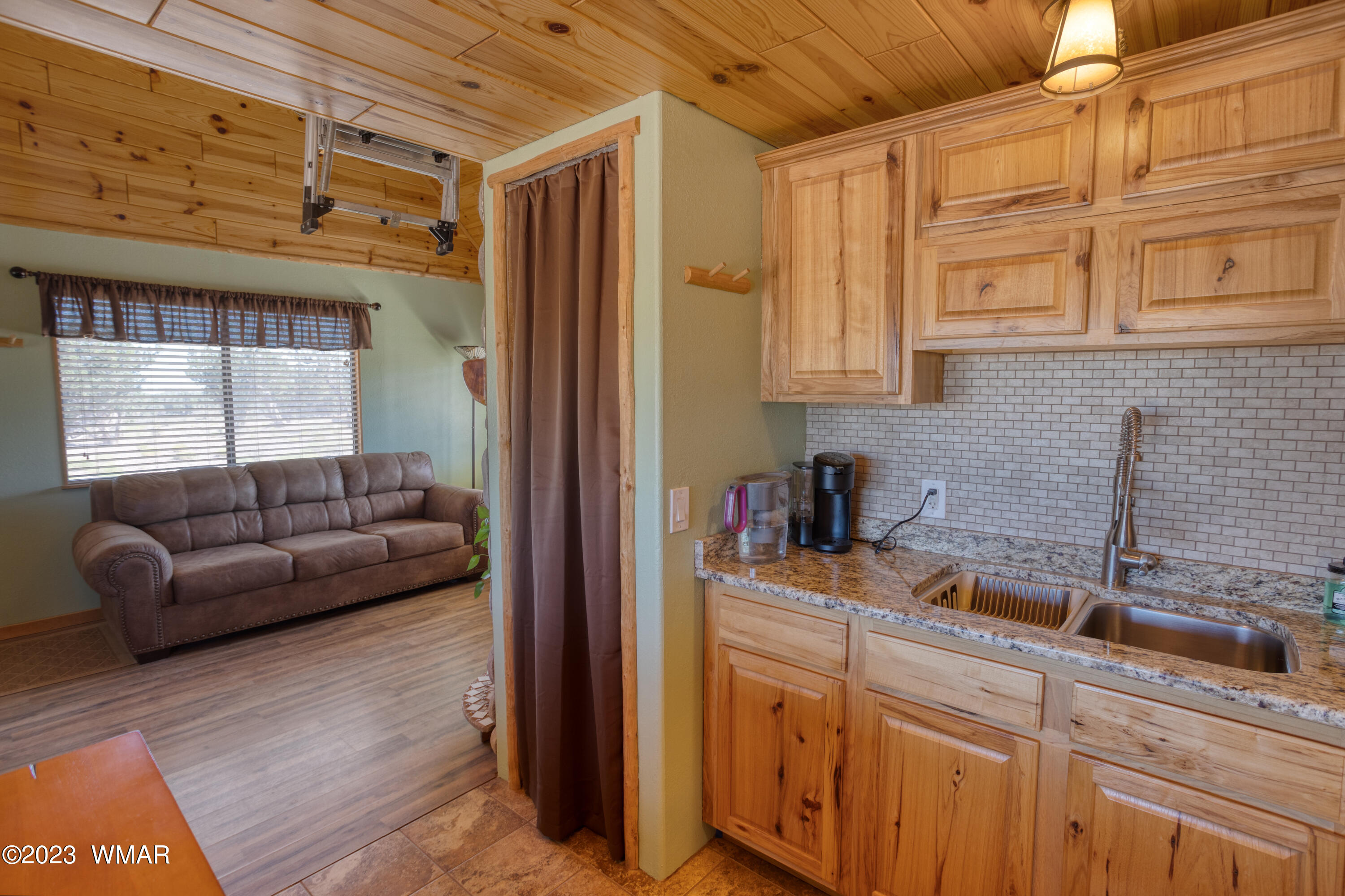 4558 Stirrup Road Snowflake, AZ 85937 - Photo 5 of 16 a living room with furniture and a window