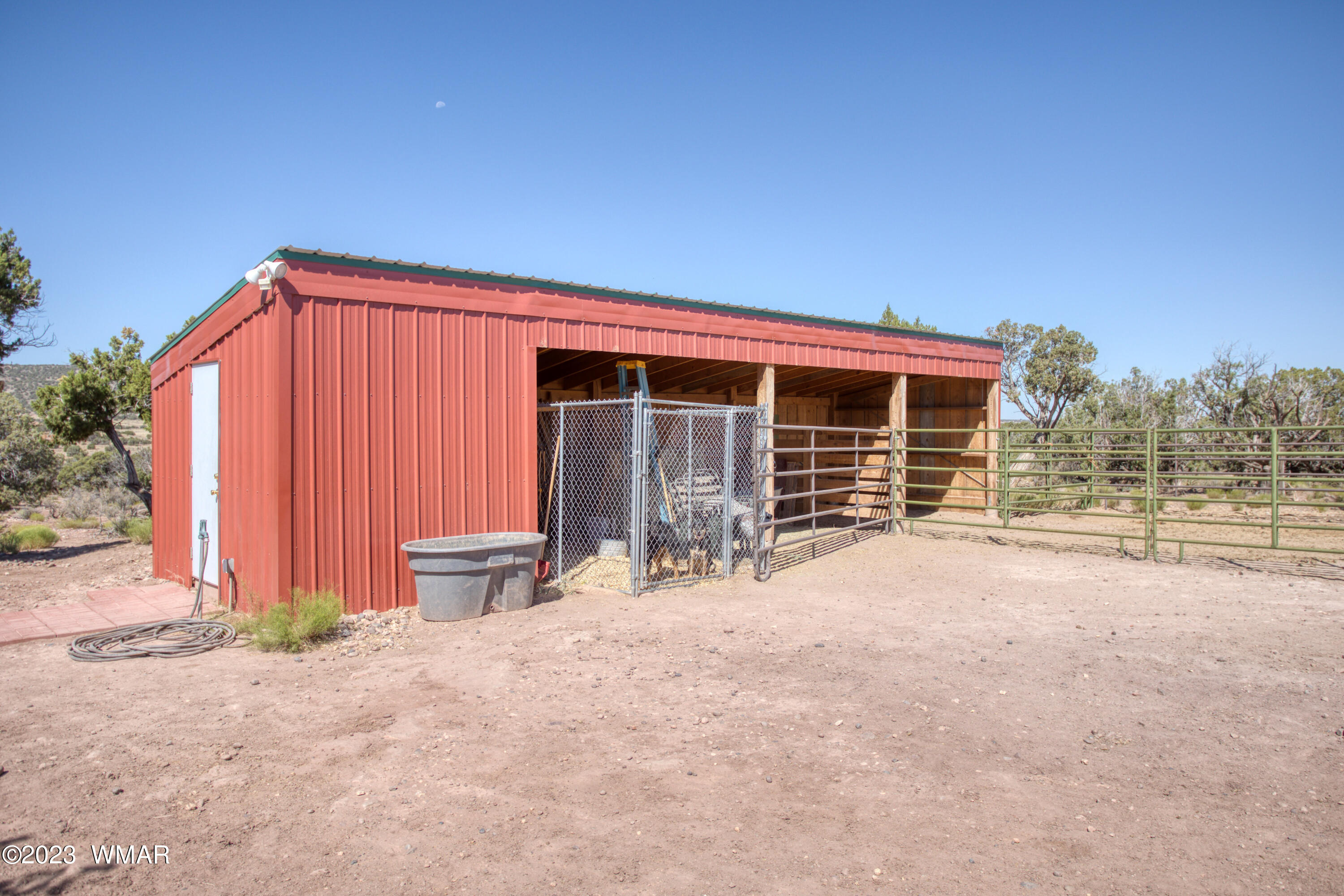 4558 Stirrup Road Snowflake, AZ 85937 - Photo 10 of 16 a view of a house with backyard and sitting area