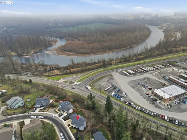 a view of a city with mountains houses